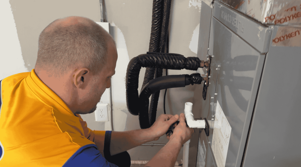 Electrician installing portable generator connection in Muskegon MI