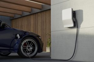 Home EV charger powering an electric vehicle in Norton Shores, MI
