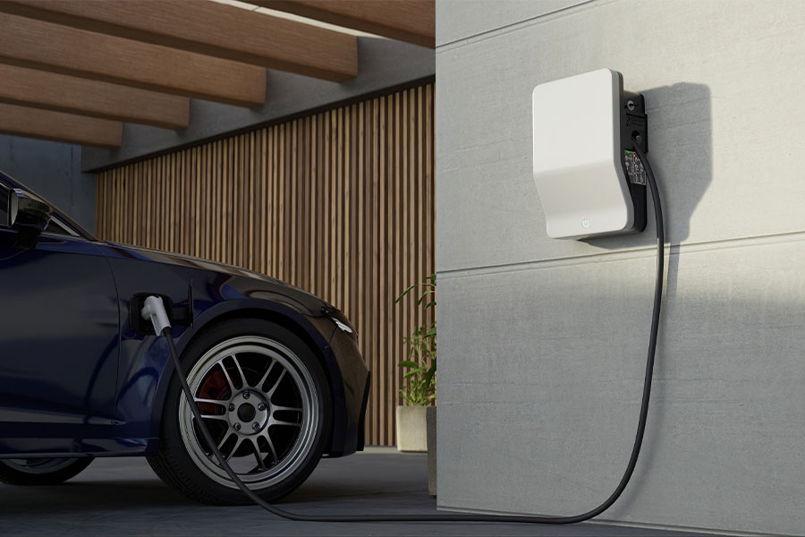 Home EV charger powering an electric vehicle in Norton Shores, MI
